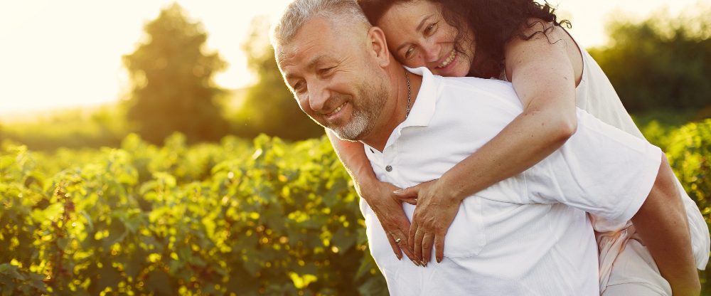 beautiful-adult-couple-spend-time-summer-field